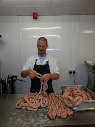 Butcher with sausages